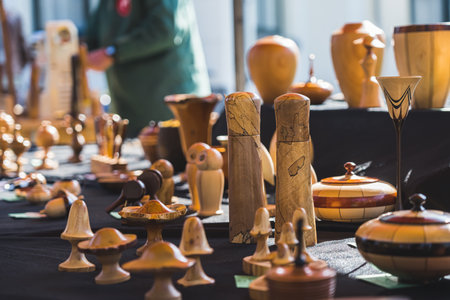 04.18.2023 Hillegom, Netherlands. Decorations, sugar bowls, and much more made by wood-working artist. Closeup shot. Dutch artistic market. High quality photoのeditorial素材