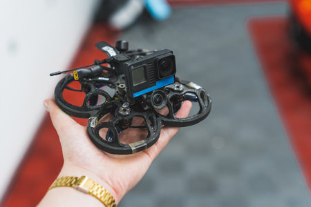 mans palm holding FPV drone, full closeup shot. High quality photoの写真素材