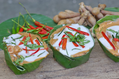 minced fish steamed in banana leafの写真素材