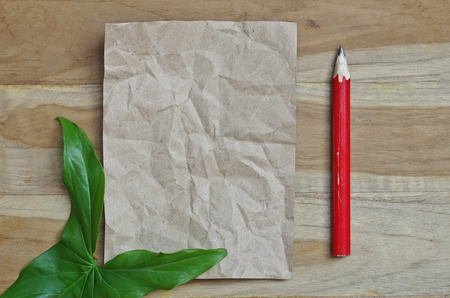 old paper and red pencil for backgroundの写真素材