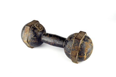 ancient dumbbell on white backgroundの写真素材