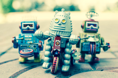 Retro robot toy, vintage color style, vintage tone background.の写真素材
