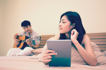 Asian couple man and woman lifestyle in the room. lifestyle people concept.の写真素材