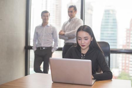 Asian businesswoman using laptop for work, Portrait business concept, 20-30 year old.の写真素材