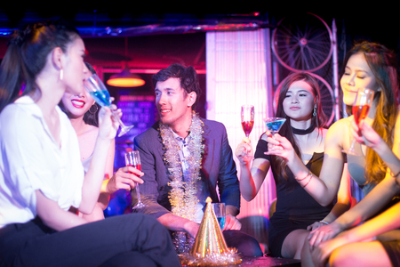 Group of asian people having party with friend at nightclub, people with party concept, 20-30 year old.の写真素材
