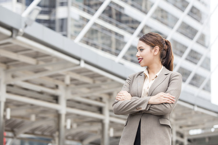 Asian businesswoman  standing and looking to camera with attractive smiling, woman leader concept, 1 person, 20-28 year old.の写真素材