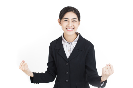 Asian Business Woman stand and smile, isolated on white backgroundの写真素材