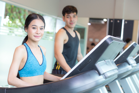 Portrait of People exercise at gym, People holding dumbbell for exercise  at gym.の写真素材