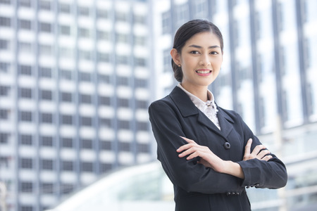 Young Beautiful Business Woman standing in City looking and ready for Work. Young Business Woman have Confident for Work with Leader concept. Asian Woman Thinking about Work.の写真素材