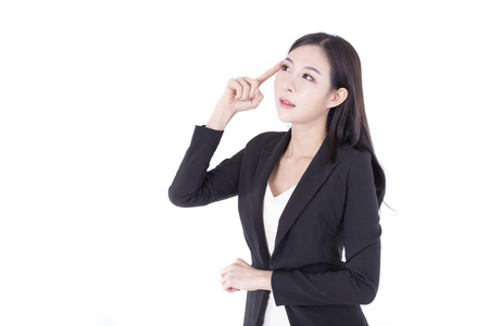 Portrait of Korean Woman Thinking for Business Plan, Woman stand on white background, Woman working concept.の写真素材