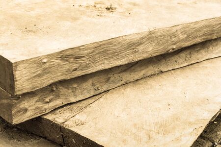 lumber and rough board lay in old factory. close up texture select focus to blur any point.の写真素材