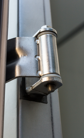 closeup door hinge of vehicle