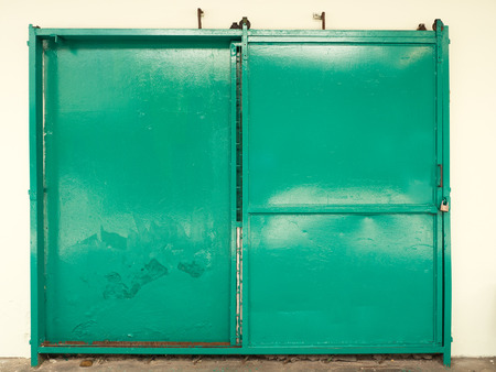 aged iron slide door, cracked colorの写真素材