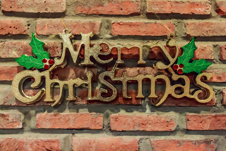 merry christmas on old bricks wallの写真素材
