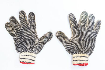 old aged gloves on white background