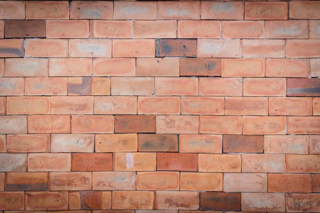 Brown rough stone wall full frame. Grungeの写真素材
