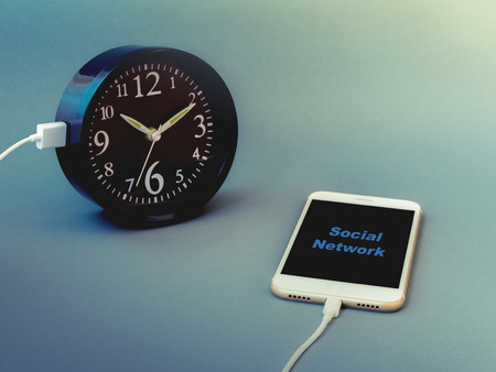 Smart phone charging time from clock with text Social Network on screen, Vintage filter. Concept of...