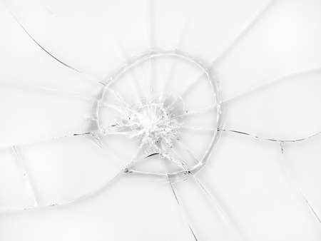 Cracked glass texture on white background. Isolated realistic cracked glass effect.の写真素材
