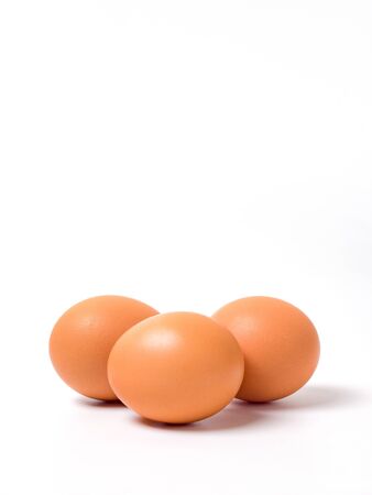 Front view and close up image of organic chicken eggs are one of the food ingredients with copy space on white background. Organic chicken eggs food ingredients concept.
の写真素材