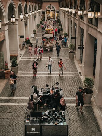 Chiang Mai, Thailand: February 12, 2019 - Many foreign tourists are busy shopping inside One Nimman,...
