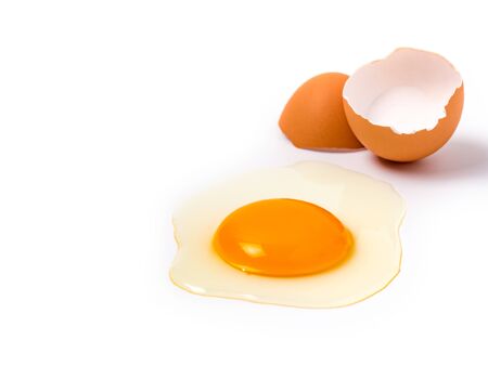 Close up image of organic chicken eggs are one of the food ingredients with copy space on white...