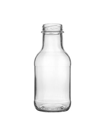 Empty transparent glass bottle for canning and preserving isolated on white background.の写真素材