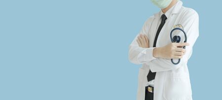 Doctor in white uniform and medical mask with stethoscope isolated.の写真素材