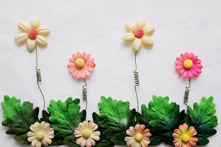 Artificial flower  on mulberry paper backgroundの写真素材