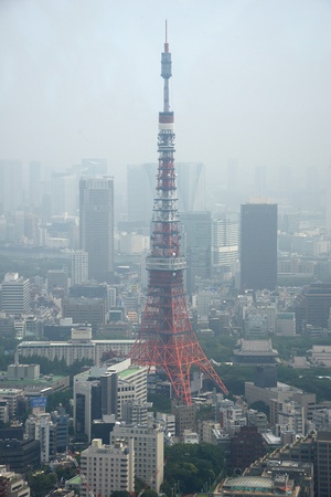 red tokyo tower surround by buildingsのeditorial素材