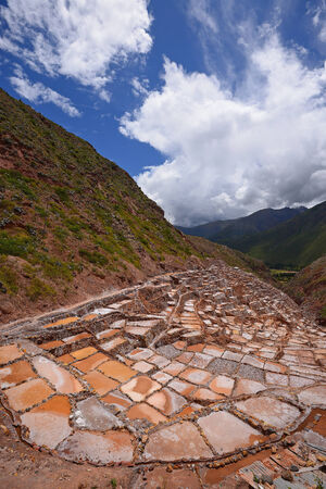 Inca ancient salt farm produced by evaporation in Peruの写真素材
