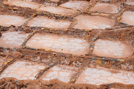 Inca ancient salt farm produced by evaporation in Peru