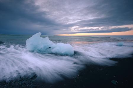iceberg on black sand beach at Jokulsarlon