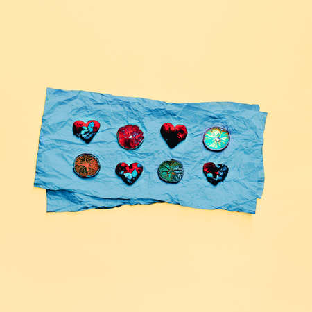 Hearts and lemons on blue paper. design Photo
