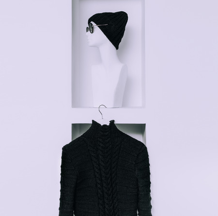 Warm Fashionable Clothing. Trend knit sweater and hat for women. black styleの写真素材