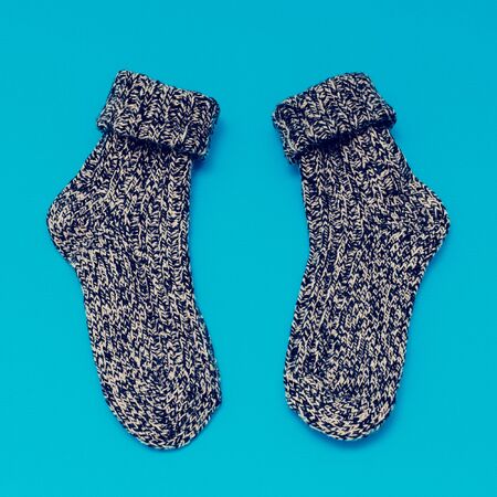Warm woolen Socks on blue backgroundの写真素材