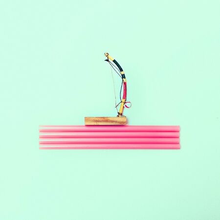 Fashion little ship on pink waves. Pastel color trend. minimal styleの写真素材