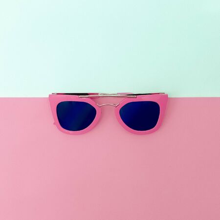 Stylish pink sunglasses. Minimalism fashion styleの写真素材