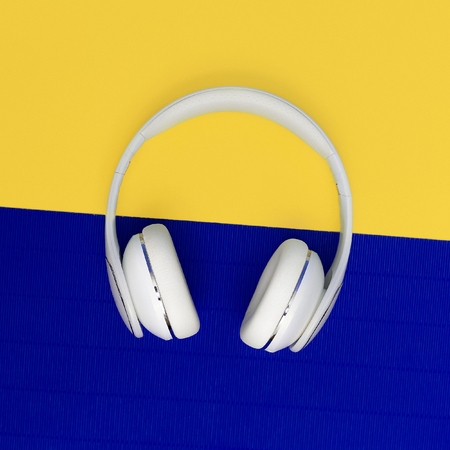 Headphones on bright background. Love music. Minimalism.の写真素材
