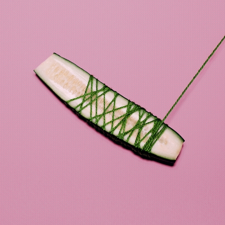 Cucumber. Pink and green. Minimalism fashion artの写真素材