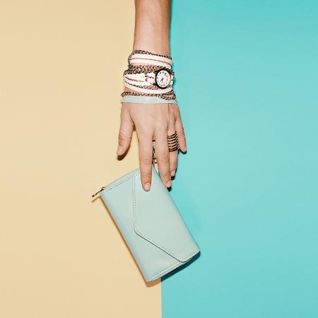 Stylish Ladies Accesories. Clutch and jewelry. Vanilla Summer.の写真素材