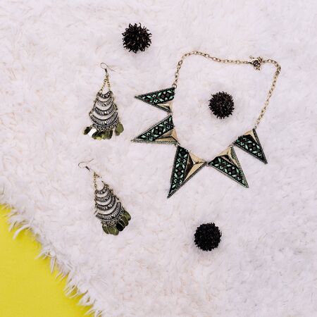 Stylish accessories. jewelry ornament and geometry print fashionの写真素材