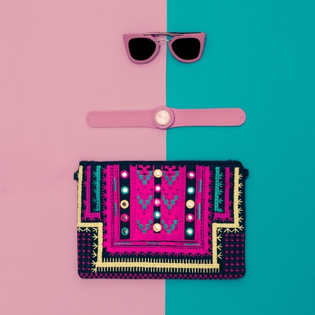 Summer in pink. Fashionable Lady accessories. Handbags, watches, sunglasses. Glamour style.