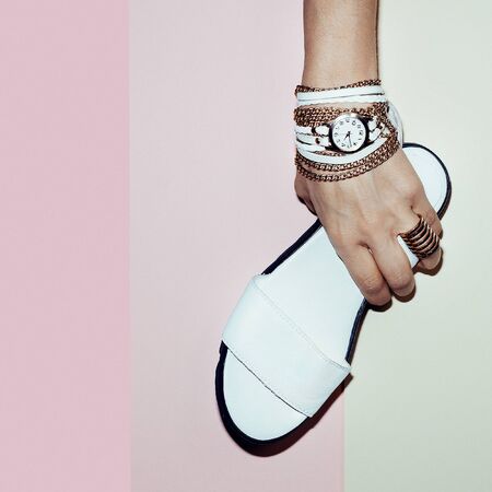 Fashion white accessories. Jewelry and shoes. Fresh summer trend.の写真素材