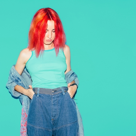 Model Teenager with colors hair and denim clothing. Stylish lookの写真素材