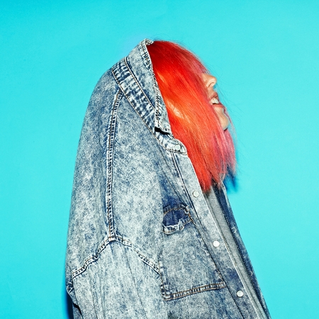 Denim Clothing and orange hair. Stylish Pretty girl.の写真素材