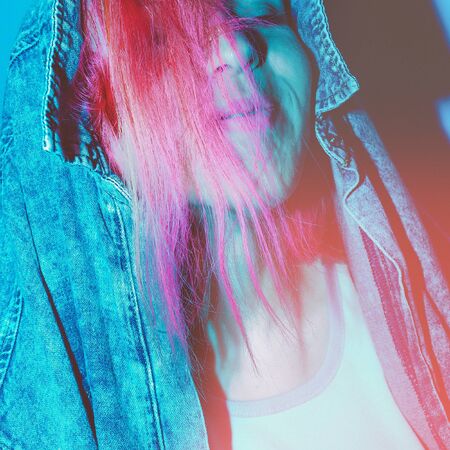 Tokyo Dreams. Girl with pink hair in fluorescent lightの写真素材