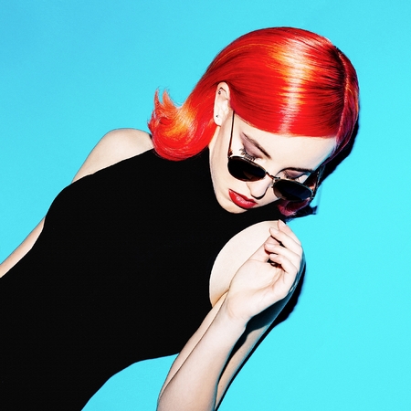 Elegant lady with red hair and stylish sunglasses. retro moodの写真素材