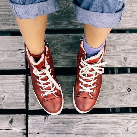 Stylish red sneakers and jeans fashion clothes. City Styleの写真素材