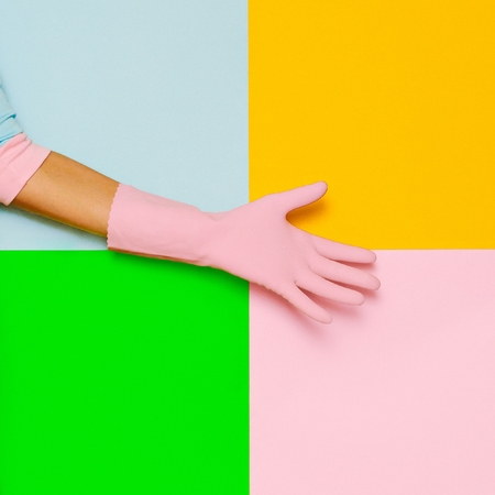 Hand in fashionable pink gloves Vanilla summer style Minimal creative artの写真素材