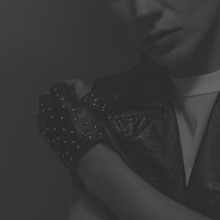 Stylish Lady in leather gloves. Black and white fashionの写真素材